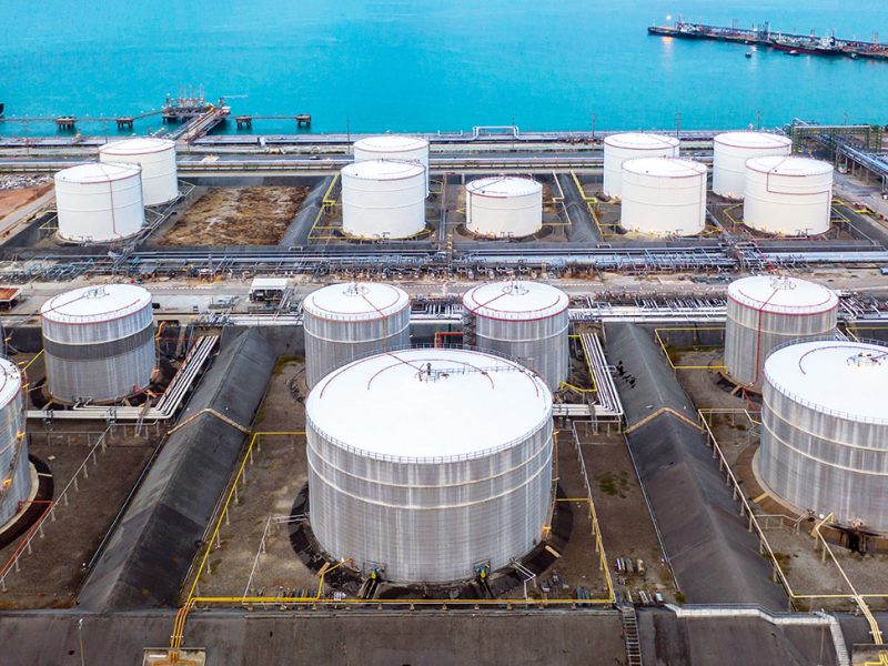 Oil and petrochemical tank, storage of oil and petrochemical products ready for logistic and transport business. Aerial view.